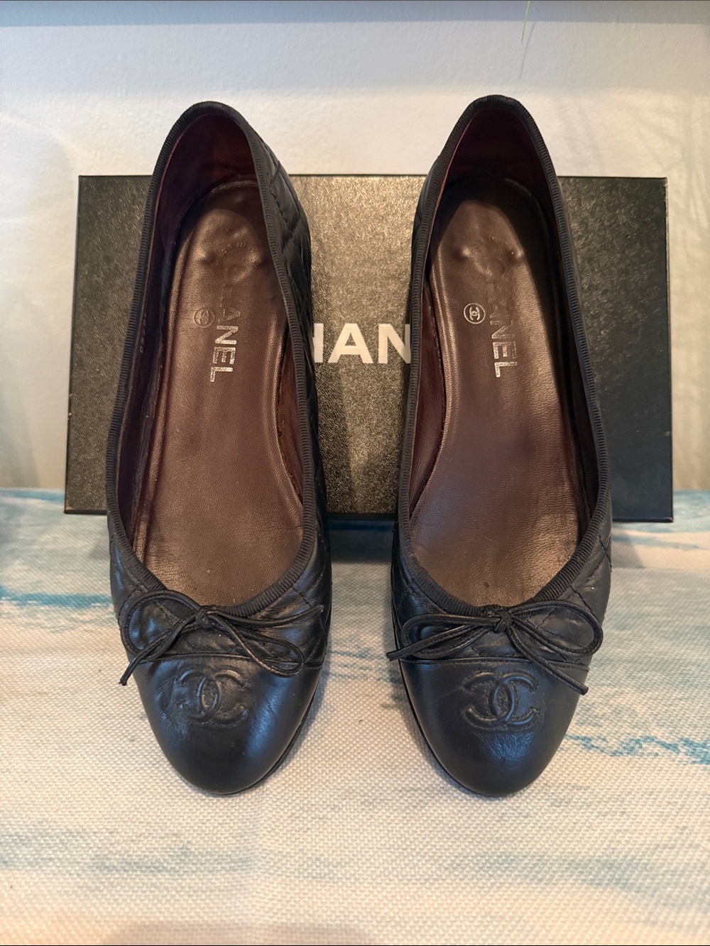 CHANEL Black Quilted Leather CC Bow Flats